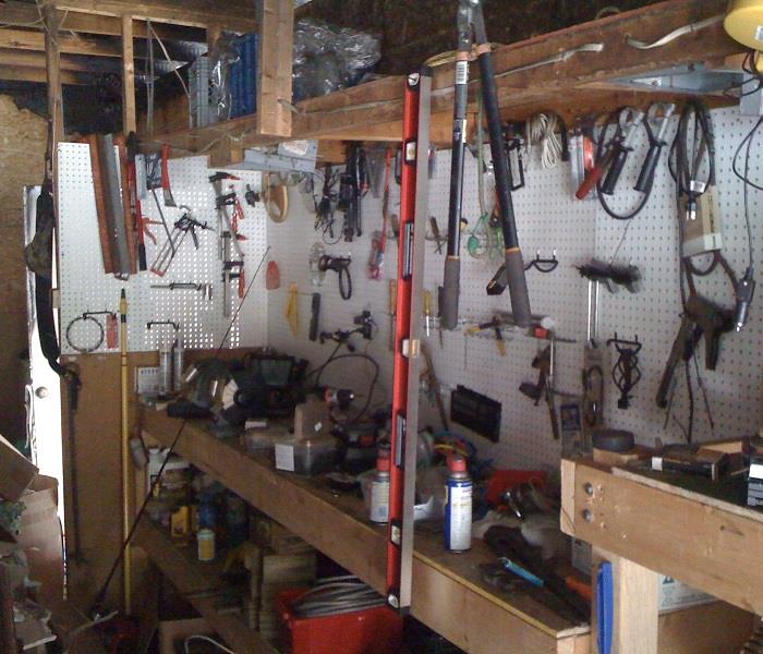 Renovated garage with tools on the new walls.