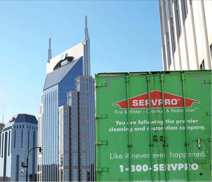 SERVPRO semi in front of commercial building.