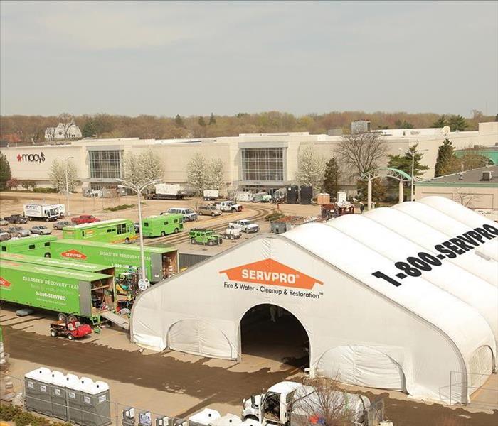 White SERVPRO tent building and equipment.